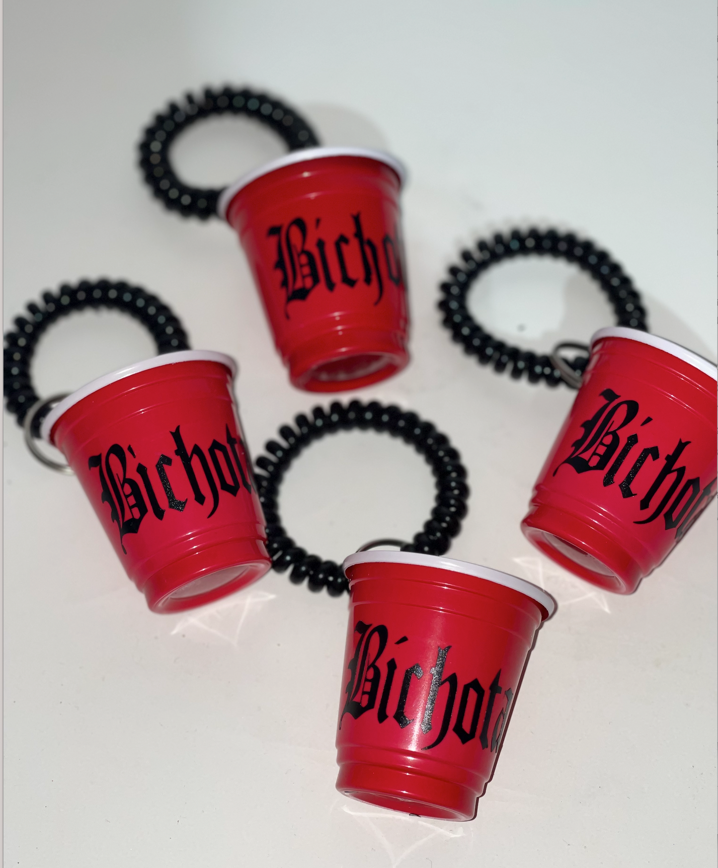 12 Bichota Shot cups With Wrist Band